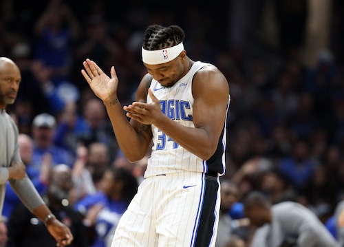 Orlando Magic center Wendell Carter Jr. reacts after hitting a three pointer against the Cleveland Cavaliers in the first half of play.